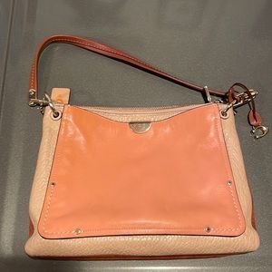 Coach brown and tan purse with matching wallet. 11 1/2x8 1/2 in. Some wear